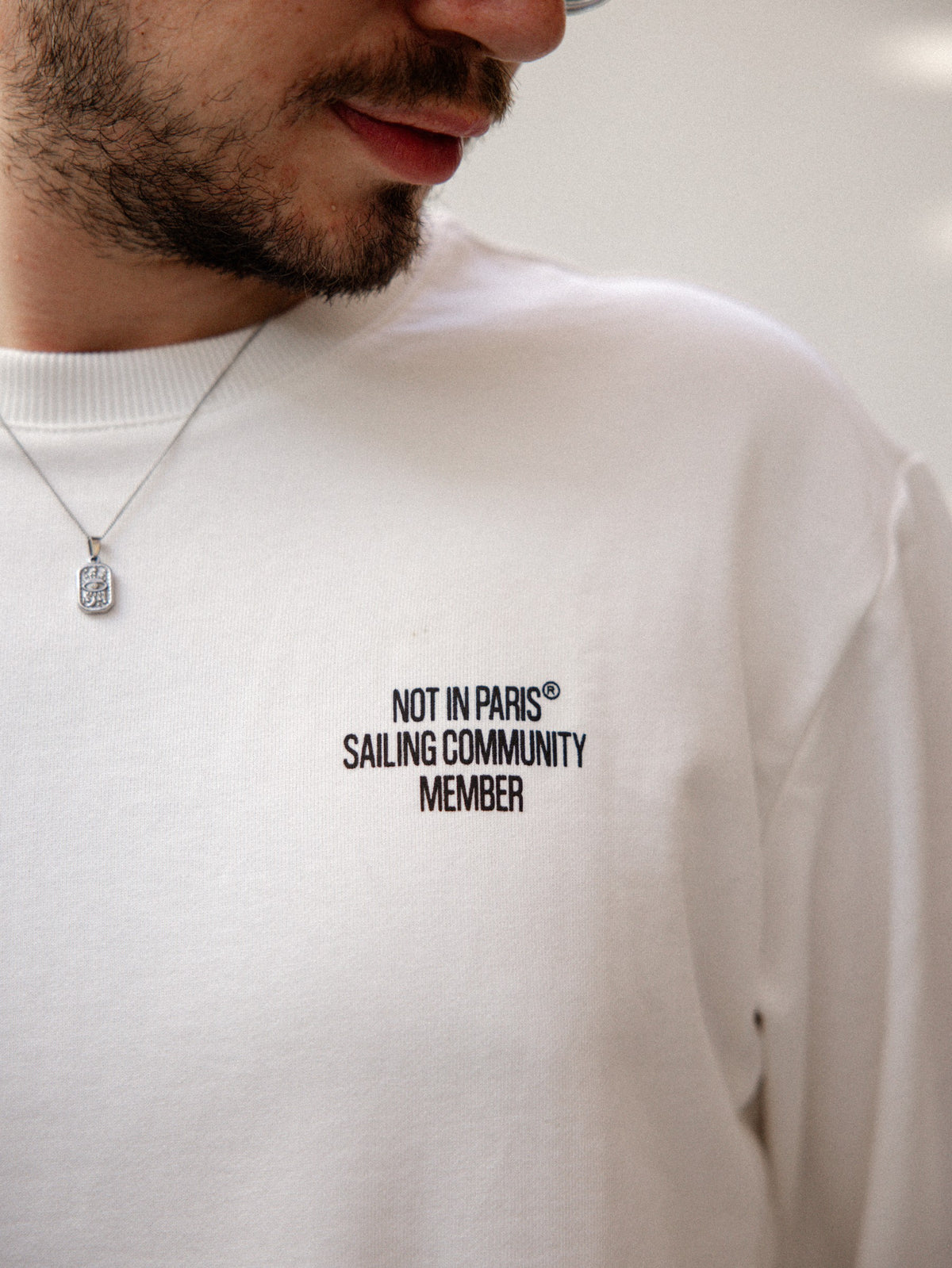 NOT IN PARIS Windy Club tee — chest print reading Not in Paris Sailing Community Member